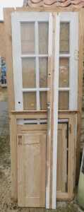 A 2x8 six panel wooden door, together with a painted wooden and multi glass pane door, further...