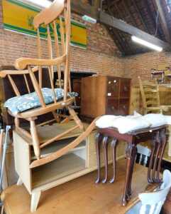 Furniture, comprising a rocking chair, a nest of three tables, a television unit, and a small...