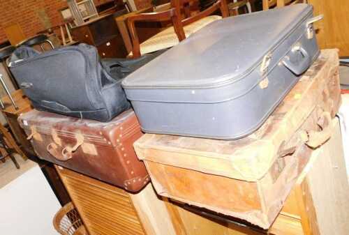 A group of suitcases and holdalls. (4)