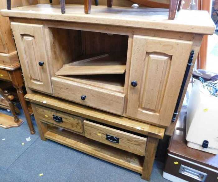 Furniture, comprising a light oak finished TV unit, with open enclosure, shelf to centre, over...