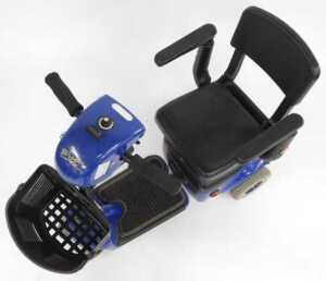 A Wispa mobility scooter, with a blue chassis and charger, with keys. - 2