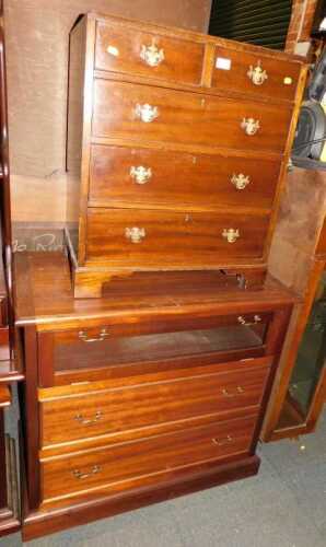 A mahogany chest of drawers on bracket feet.