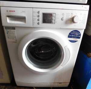 A Bosch Max Varioperfect washing machine, in white.