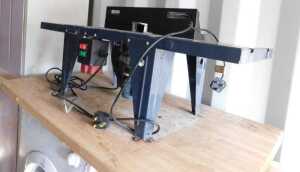 A Rockwell router table, with router.