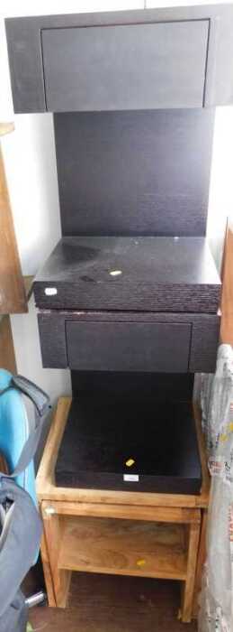 Furniture, comprising two black ash bedside cabinets with drawers, and a nest of two walnut tables.