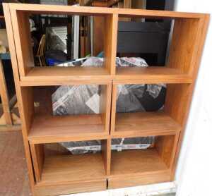A freestanding walnut bookcase unit, and a small walnut two enclosure unit.