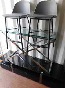 Furniture, comprising a smoked glass topped console table, rectangular in form, with X frame...