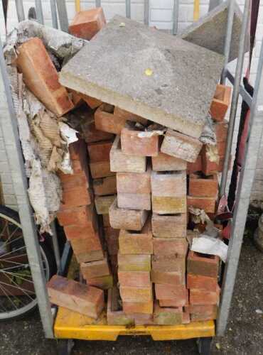 A crate containing bricks, masonry cap ends, and thermalite blocks, (crate not included.)