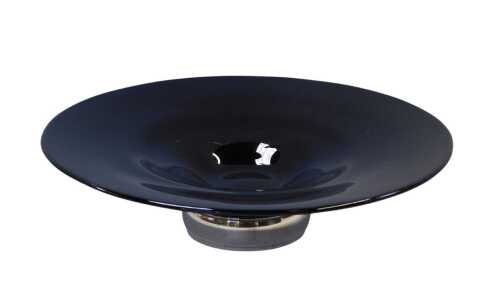 A dark purple tinted glass charger, raised on a circular foot decorated with a silver band,...