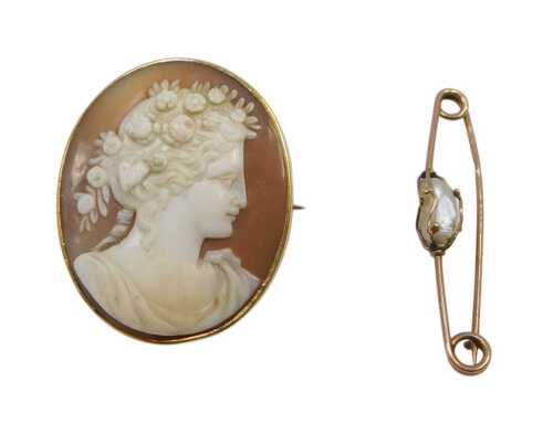 Two brooches, comprising a 19thC shell cameo brooch, depicting maiden with flower headdress, in...