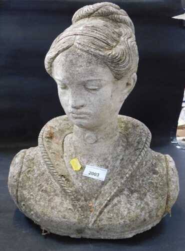 A stoneware bust of a lady.