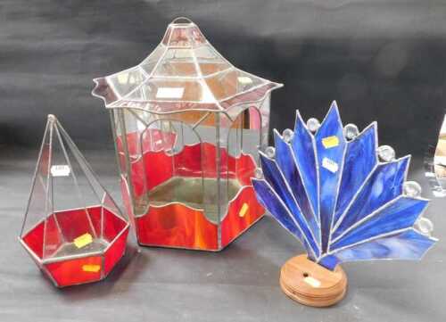 Glassware, comprising a mirror backed red and clear glass terrarium, a smaller red and clear...