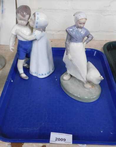 A Bing & Grondahl porcelain figure group, modelled as a young boy and girl embracing, number...