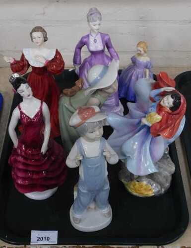 A group of porcelain figures, comprising Coalport Ladies of Fashion, Caroline and Sarah,...
