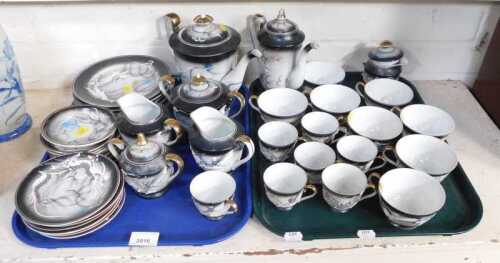 Ceramics, a Japanese inspired tea and coffee service, to include teapot, coffee pot, sugar,...