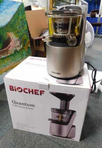 A boxed BioChef Quantum cold press juicer.
