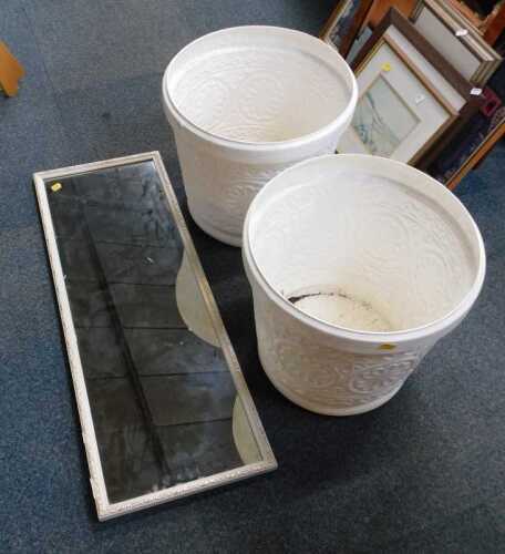 A white finished rectangular mirror and two ornate plastic circular planters. (contents under 1...
