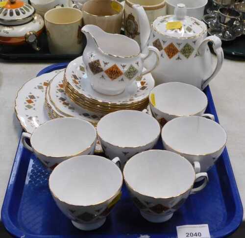 A Colclough part tea service, items include teapot, milk, saucers, side plates, cups. (1 tray)