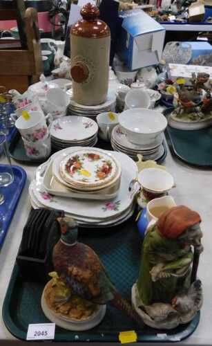 Ceramics, to include pheasant statue, woman with chicken, small milk jug, hot water bottle,...