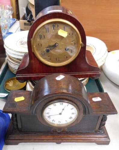 Two wooden cased mantel clocks, one with Roman numerals to chapter ring, one with Arabic...