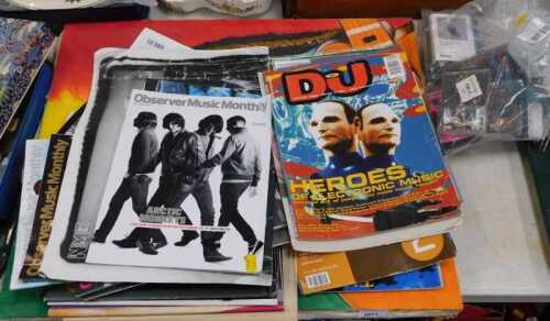 Music-related magazines, together with a painting on canvas of Bob Marley and three minidiscs...