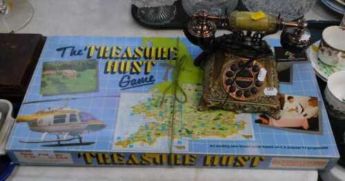 A Treasure Hunt board game and an antique-style telephone. (2)