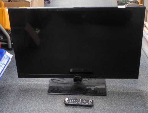 A Panasonic LCD television, model TX-L32XM6B, with remote.