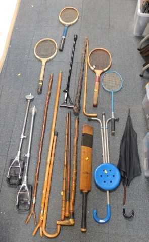 A group of walking sticks, including mobility aids, shooting sticks, etc, together with a...