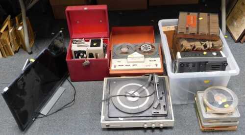 Audio and visual equipment, including a reel-to-reel tape recorder and reels, a record deck, a...