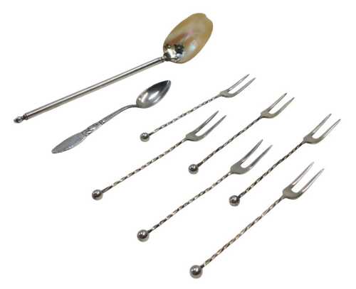 A small collection of Continental cutlery, to include a ceremonial spoon, with shell bowl, Georg...