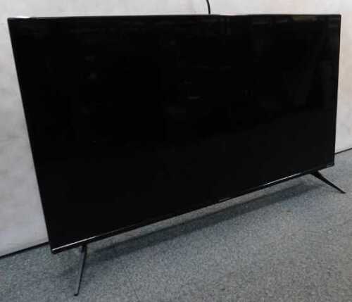 A Sharp 40" flat screen television, model number 40FD6K.