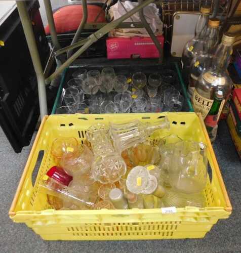 Glassware, to include three large whisky bottles, all empty, drinking glasses, decanters, water...