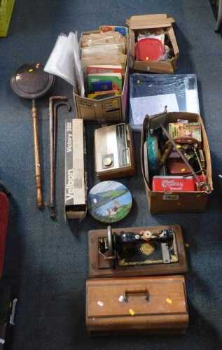 General household items, to include sewing machine, transistor radio, a bed warmer, two walking...
