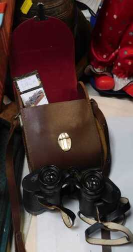 A pair of Carl Zeiss Jena binoculars, in a leather case.