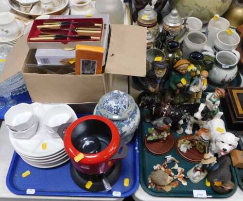 Household items, including cocktail picks, darts, a small trophy, a sheath knife, an AA...