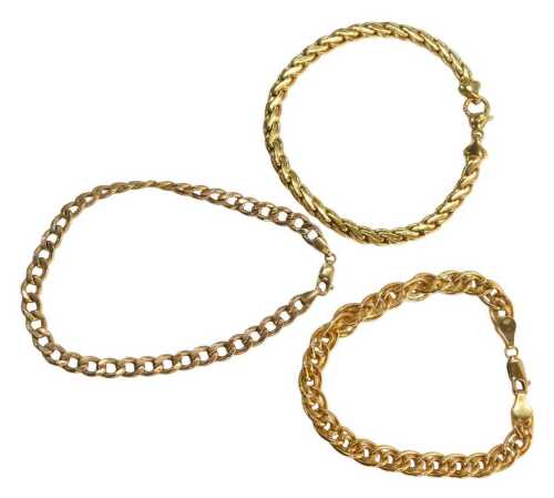 Three flat curb bracelets, comprising a rose gold flattened curb bracelet stamped 375, 20cm long,...