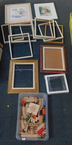 Toys, pictures and prints, to include a town layout with track and vehicles made from wood,...