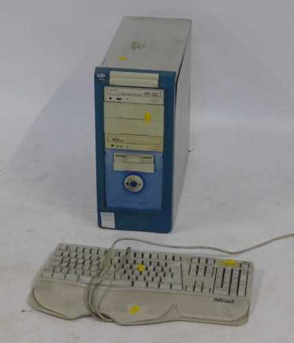 A computer tower and keyboard.