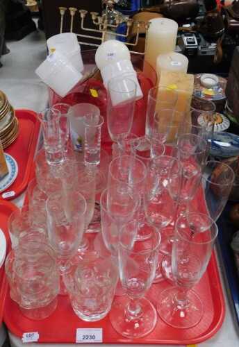 Glassware, to include drinking glasses, champagne glasses, tumblers, small candlesticks, a...
