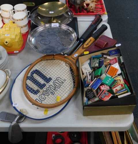 Household items, to include tennis racquets by Wilson, golf clubs including one putter and one...