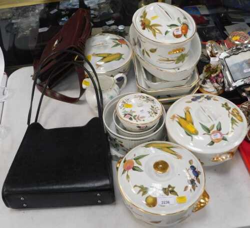 Ceramics, a part Evesham pattern dinner service, including two lidded tureens, an oval lidded...