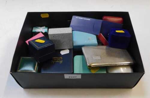 A box containing a quantity of empty jewellery boxes.