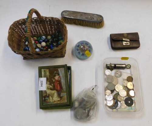 A glass paperweight, millefiore, glass marbles, a silver hairbrush, clothes brush, foreign...