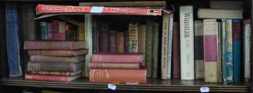 A large wooden puzzle, a picture of a gentleman, signed, in frame, books to include Whistler,...