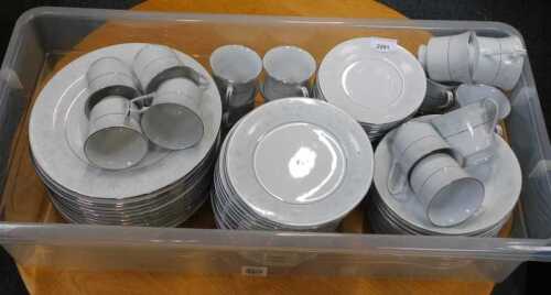 A Crown Mint part dinner service, decorated in white and silver highlights, items include...