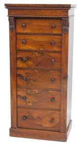 A William IV rosewood Wellington chest in the manner of Holland & Son, with moulded top, six...