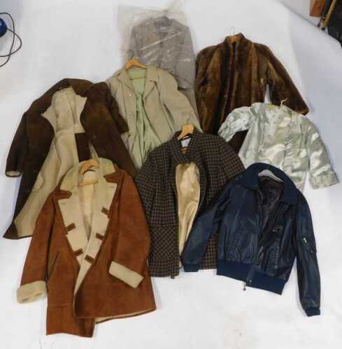 Textiles, clothing, include a lady's green Oriental jacket, a lady's trench coat, lady's jacket...