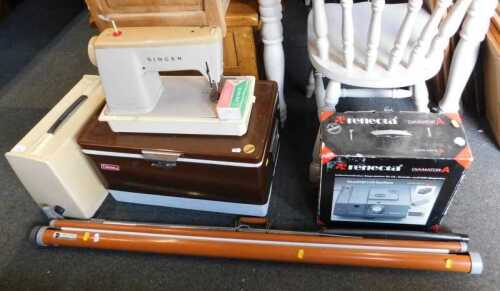 An electric Singer sewing machine, a Colman coolbox, a Reflecta projector together with a...