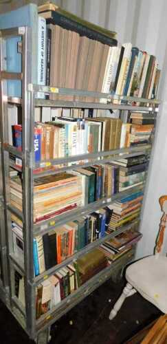 Books, to include A History of Seafaring, Conquestadors, guidebooks on the USA, France, Florence...