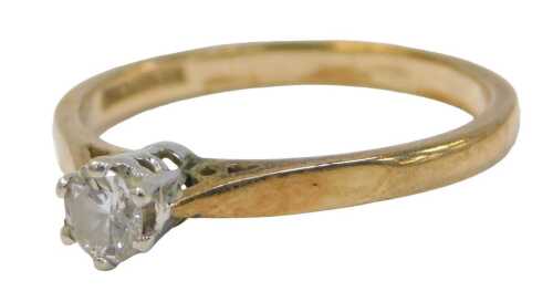 A 9ct gold and diamond solitaire ring, high claw set, approx 0.25cts, size K, 1.8g all in.